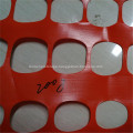 orange plastic road barrier safety net